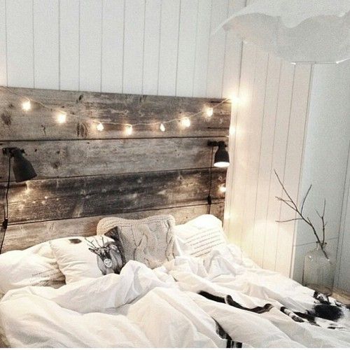 light up reclaimed wood headboard makes the bed cozier