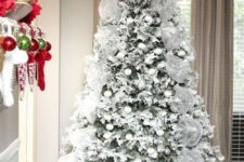 31 snowy tree with white ornaments and fabric garlands