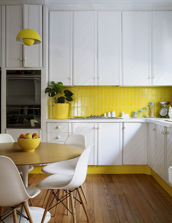 vertical stack bond clad subway tiles in this kitchen add a pop of color and pattern and make the space cooler and catchier