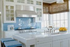 32 light blue subway tiles for adding a coastal feel in the kitchen
