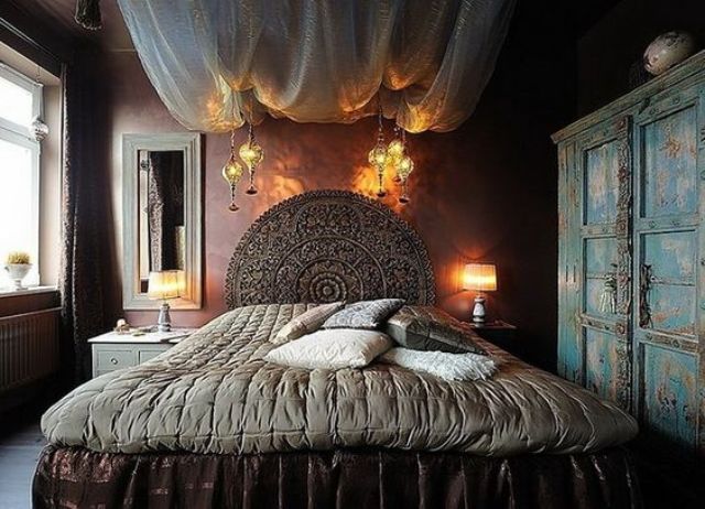 sexy oriental bedroom with a unique carved headboard
