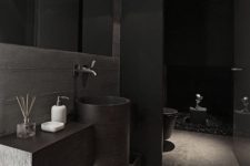 33 this minimalist bathroom looks cool beacuse of wood and stone textures