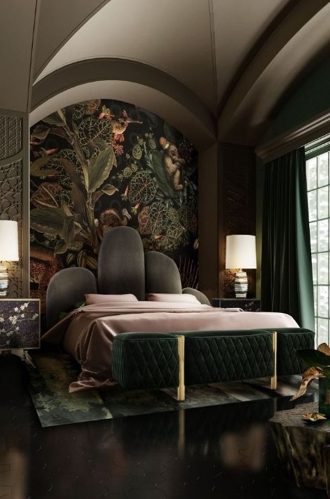 a moody maximalist bedroom with alcove ceilings, a bed with a statement headboard, a dark green bench and curtains plus a dark accent wall