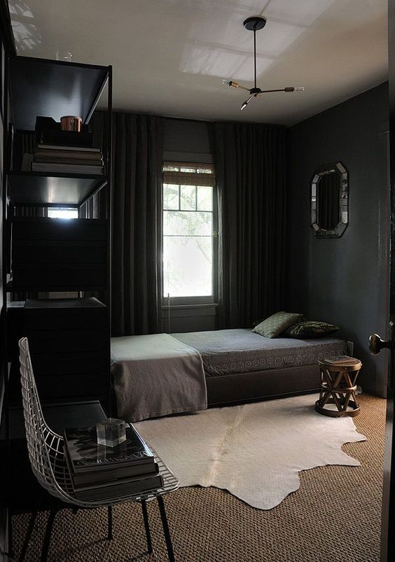 cozy bedroom in black with textural textiles