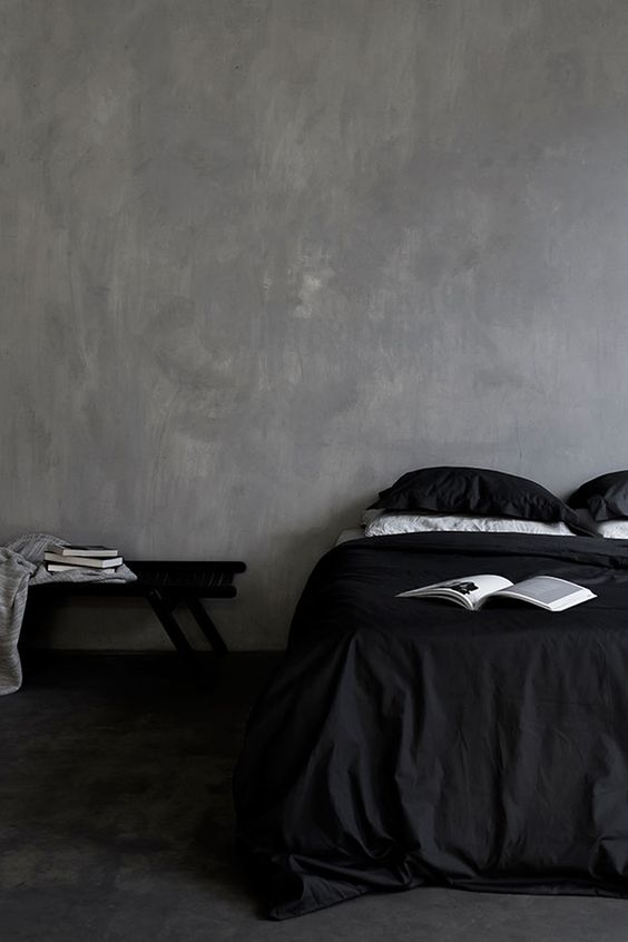 dark alluring bedroom with very simple and minimalist decor