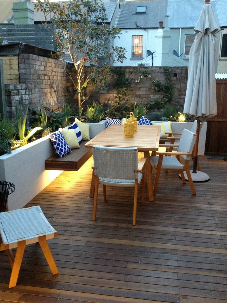 lights hidden under floating benches works great for small patios