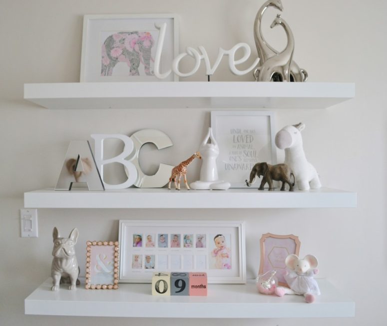 white floating shelves nursery