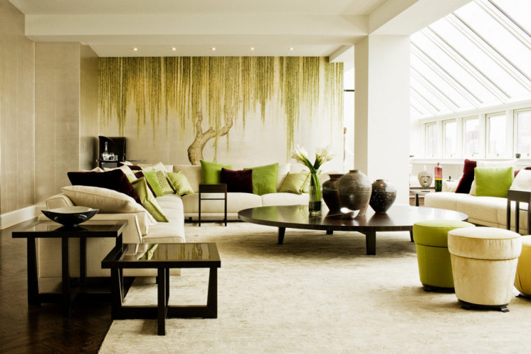 A wall art with a peaceful tree is perfect for a calm living room design. (Inform Interiors)