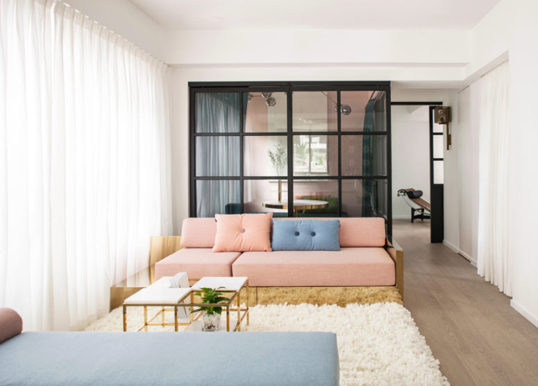 This modern apartment in Hong Kong was renovated to become not only a living space but also a showroom of the young couple