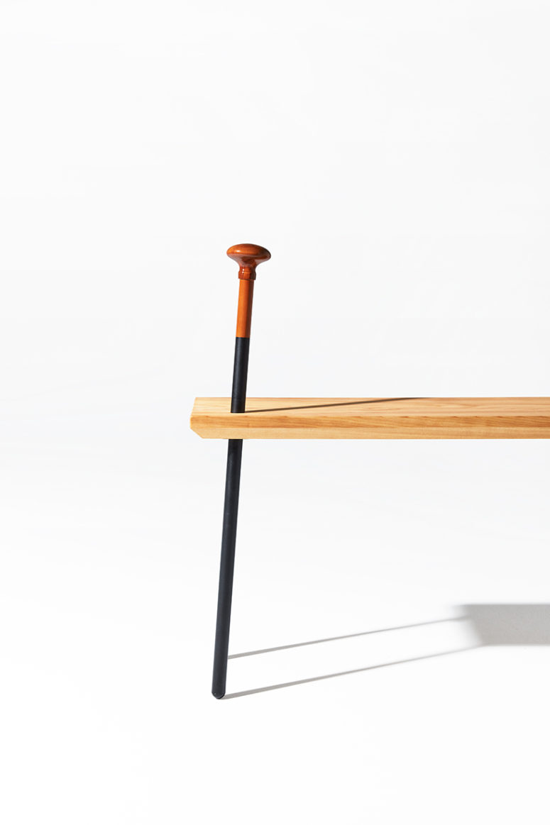 The cane both serves as a novelty leg for the bench, and as a means of support to elderly patrons