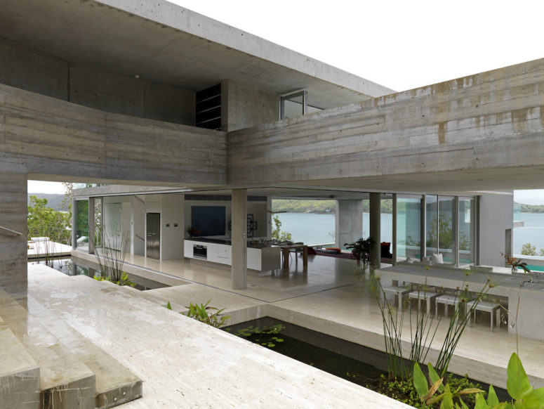 water features There are ponds and waterfalls placed both indoors and outdoors to eliminate the borders and a lot of glazing to enjoy the views of the ocean