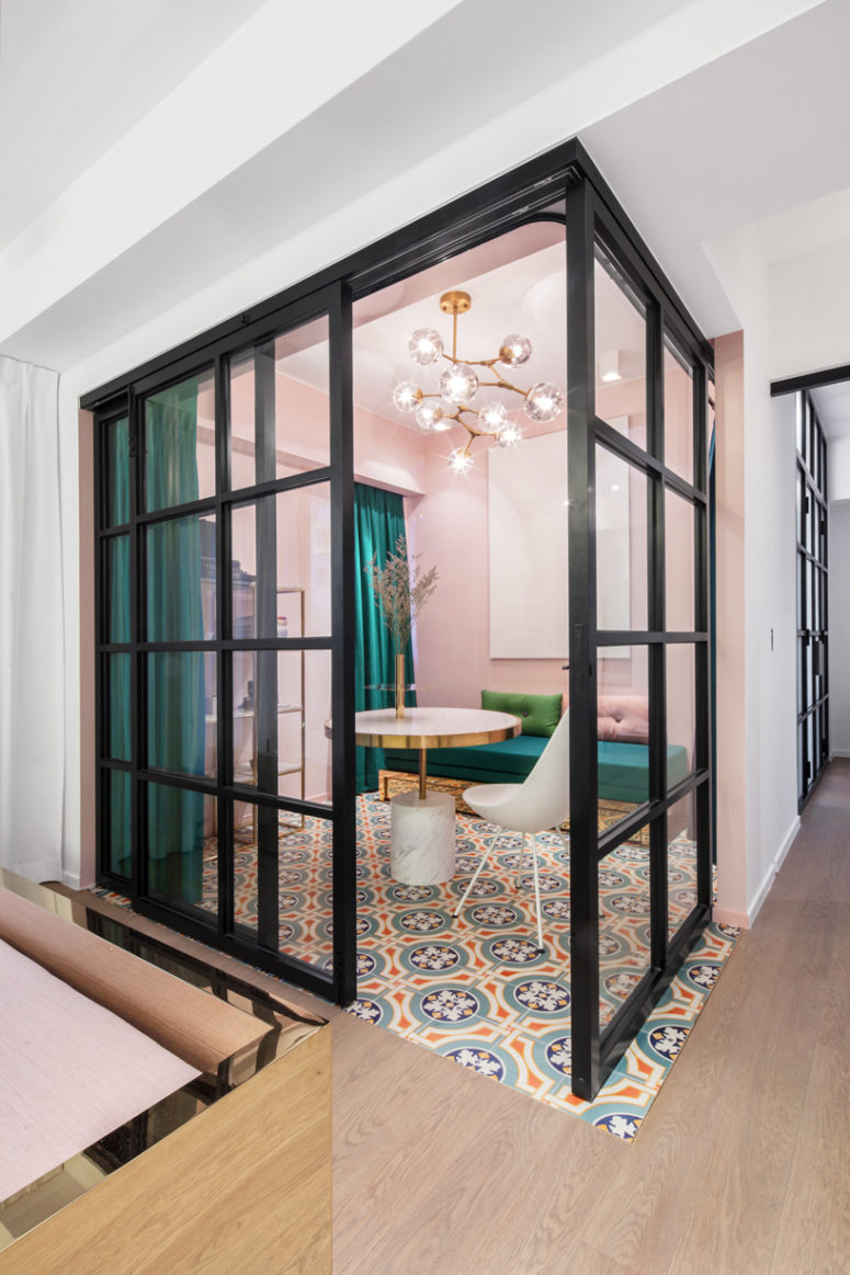 glass interior doors Suspended metal, double-sliding glass doors and dark jade drapery fully transform the level of privacy in the space