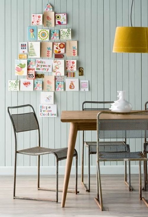 cards attached to the wall in a tree shape