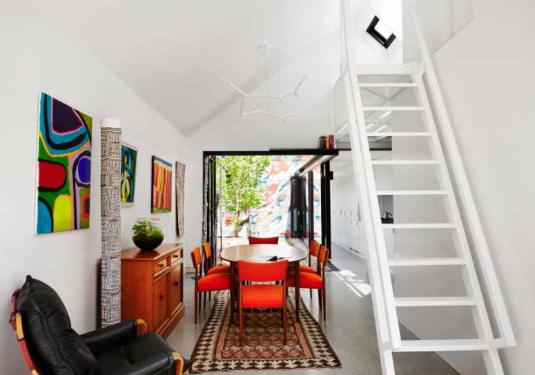 cheerful space I love bold artworks and tapestries that add to the cheerful decor