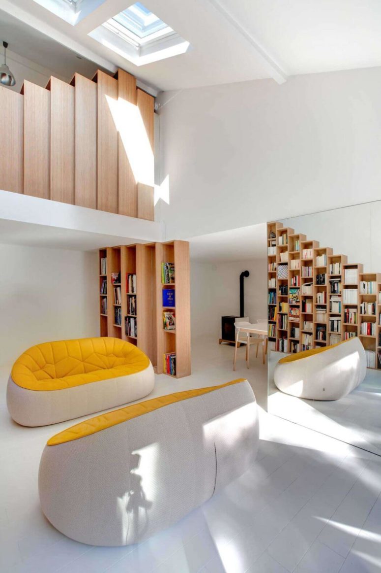 The furniture is bold and modern, the walls, floors and ceilings are white to give a perfect backdrop for the bold decor The furniture is bold and modern, the walls, floors and ceilings are white to give a perfect backdrop for the bold decor
