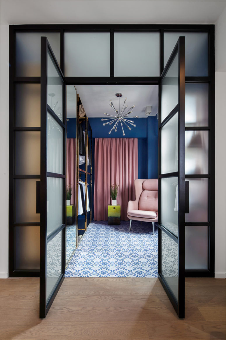 walk in wardrobe The retail-inspired walk-in wardrobe is complete with custom freestanding polished brass closets