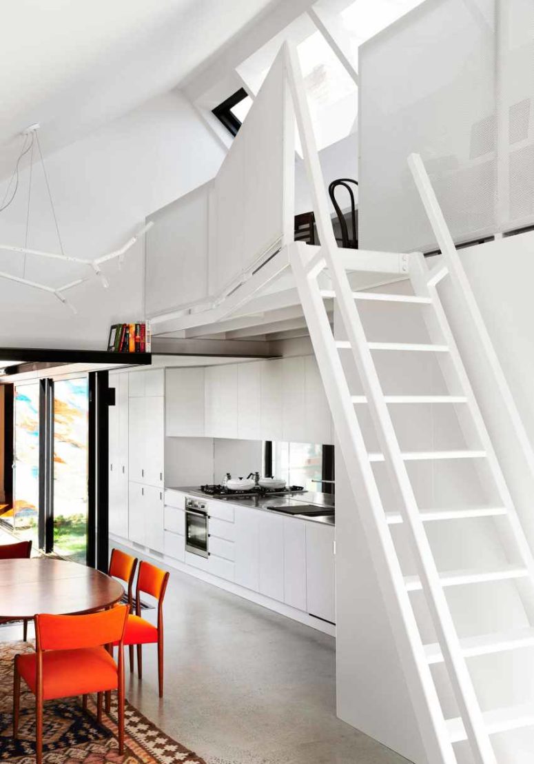 small office There's a staircase that leads to a small working space above the kitchen