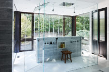 06 The bathroom features a glass cube shower and extensive glazing to catch all the best of the views