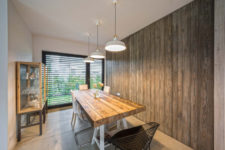 06 The dining zone features a lot of reclaimed wood and modern touches