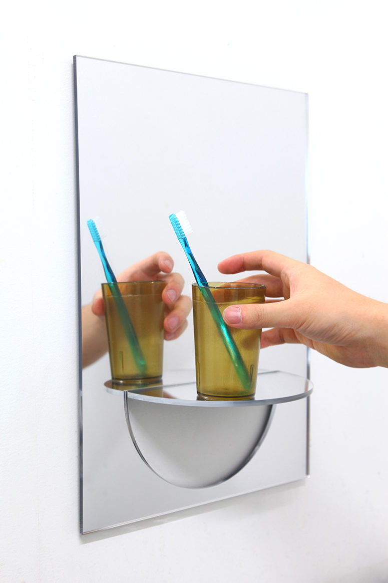 The ‘U mirror’ creates an interesting illusion by warping the reflection of the glass into a functional form The ‘U mirror’ creates an interesting illusion by warping the reflection of the glass into a functional form