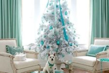 06 a white Christmas tree with tiffany blue ornaments and a large bow