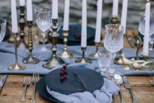 08 moody winter tablescape in grey and black, gilded candle holder add a refined touch
