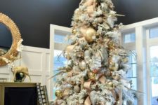 09 a flocked tree with silver, gold and copper ornaments for a glam look