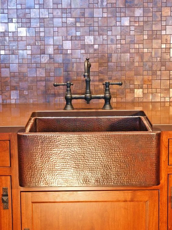metallic mosaic tiles in copper and a metal copper sink