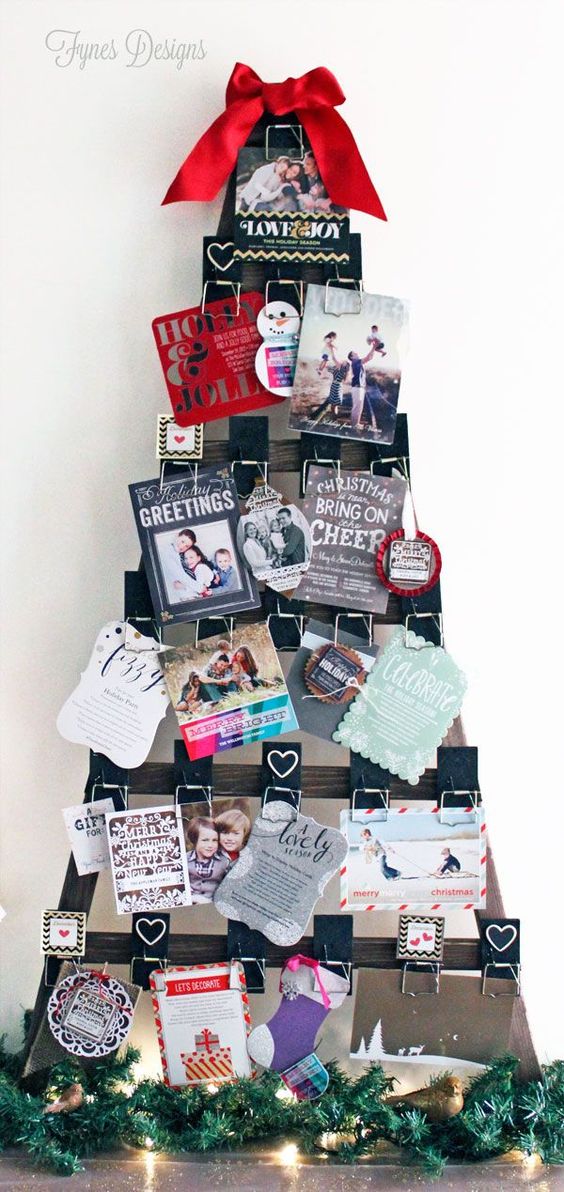 tree-shaped wooden frame with cards on it
