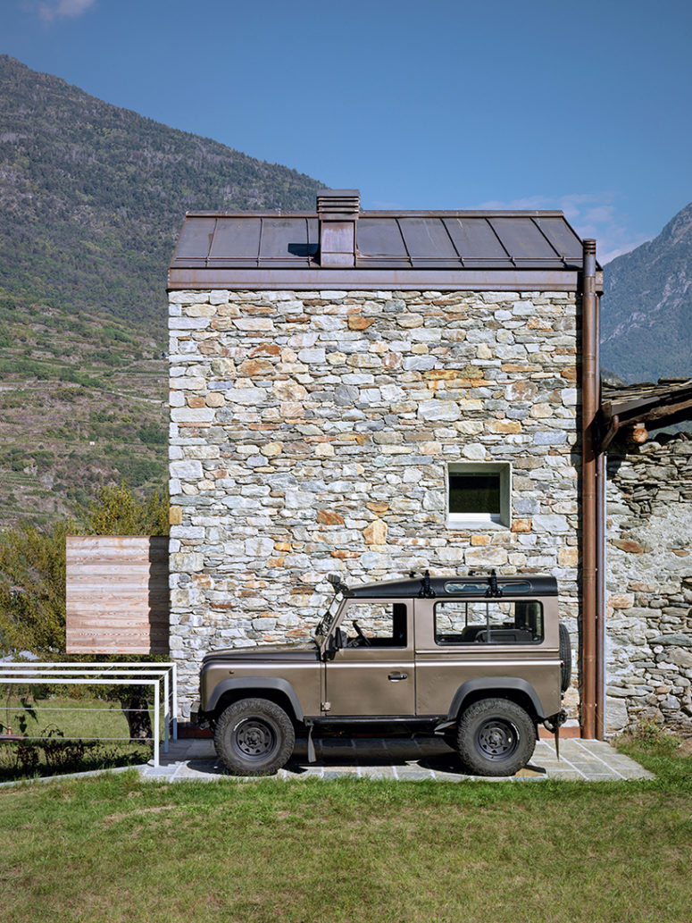 Modern Alpine House With An Extensive Use Of Timber And Stone