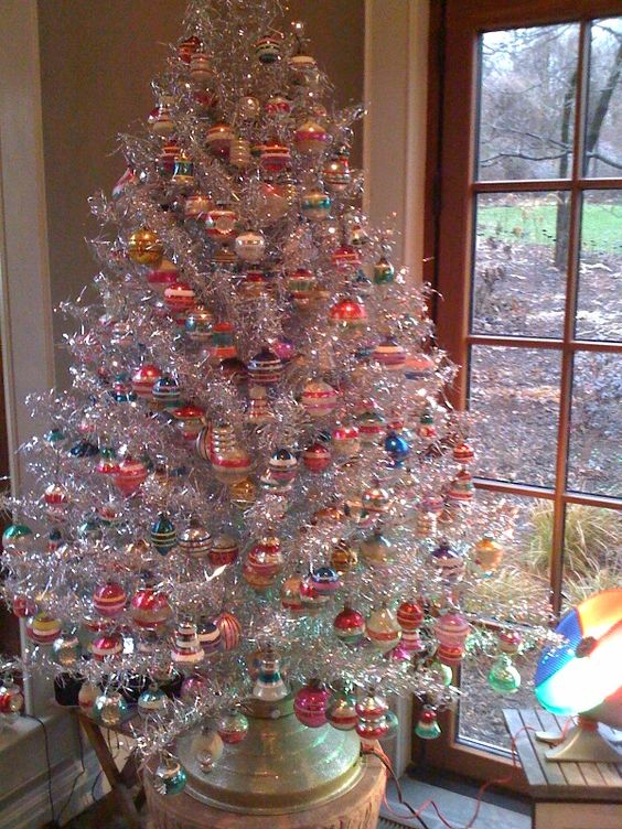 a vintage tree with multiple colorful ornaments