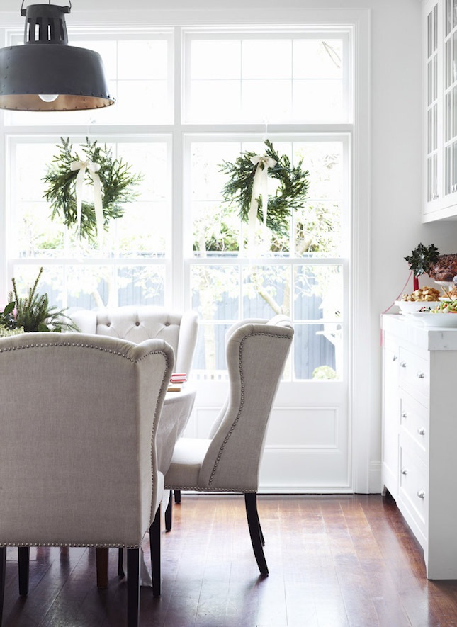 a wreath-bedecked window is classics
