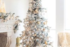 11 metallic decor is a popular option for a flocked tree as it bring glam and chic