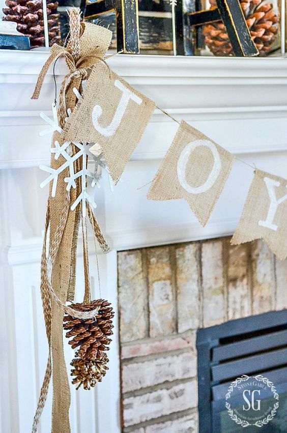 a burlap bunting, pinecones and a snowflake