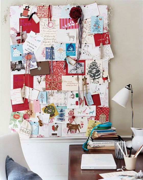 a fabric covered board with all the cards for Christmas