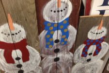 12 handpainted snowmen on reclaimed wood boards