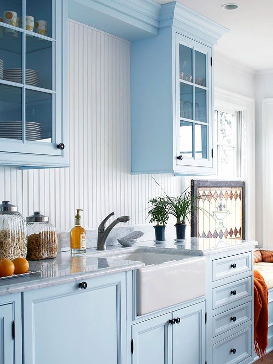 narrow white beadboard looks very delicate with light blue cabinets
