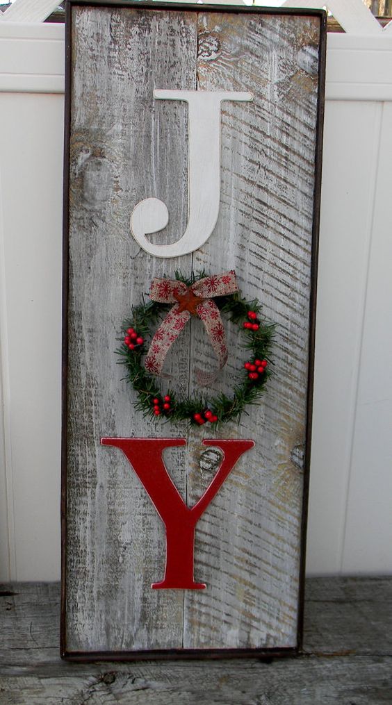 16 weathered wooden JOY sign with a small wreath