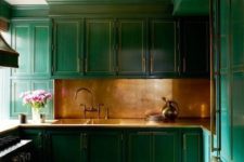 17 emerald kitchen with a copper backsplash and fixtures