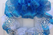18 a blue and white deco mesh wreath with silver snowflakes