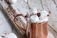 18 copper mugs with hot chocolate and marshmallows