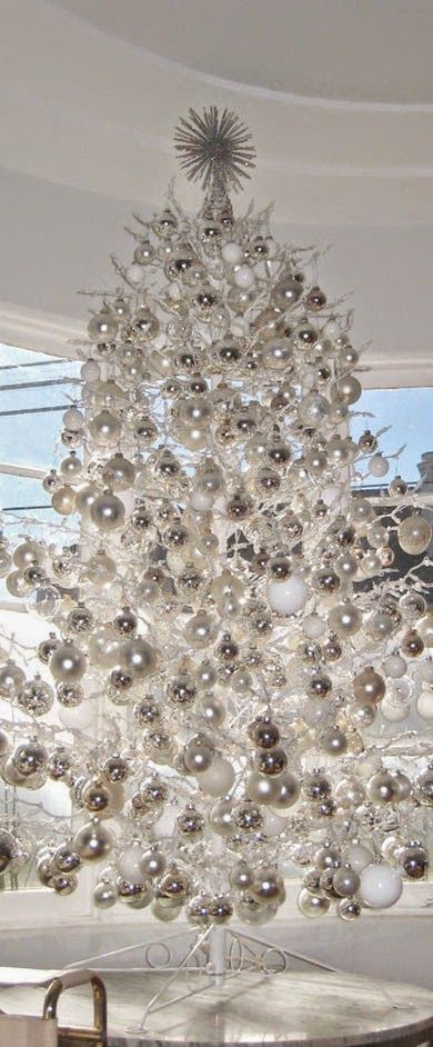 silver, pearl and white tree made of only ornaments hanging on metal wire