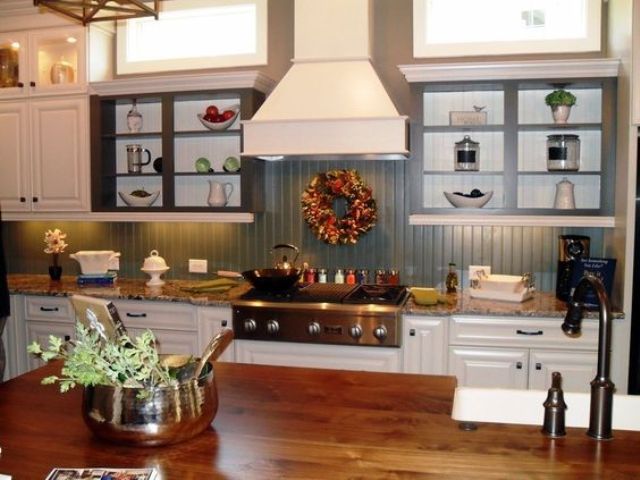 slate blue beadboard backsplash contrasts with white cabinets