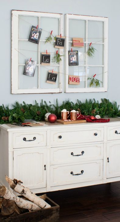 old window frames with threads for hanging cards on them