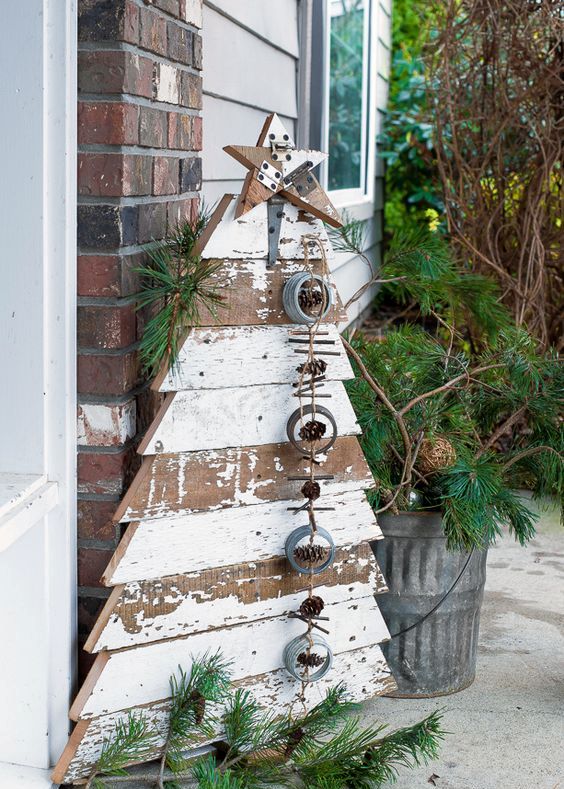 reclaimed wood Christmas tree and star in chippy white boards for a front porch