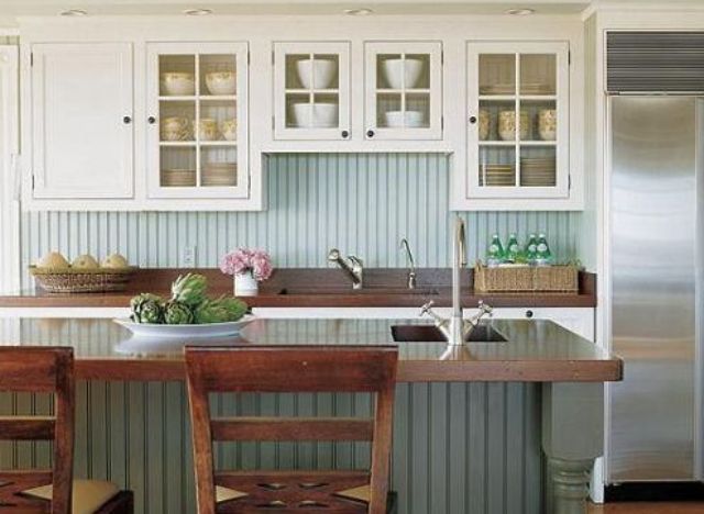 green beadboard backsplash echoes with the kitchen island cover