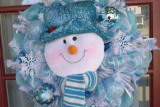 24 turquouse, glitter and white deco mesh wreath with a snowman