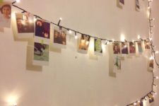 24 use clips to attach cards to fairy lights