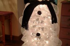 25 a tomato cage lit up snowman can be DIYed of lights and white mesh ribbon