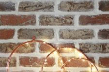 27 copper wreaths with lights for industrial decor